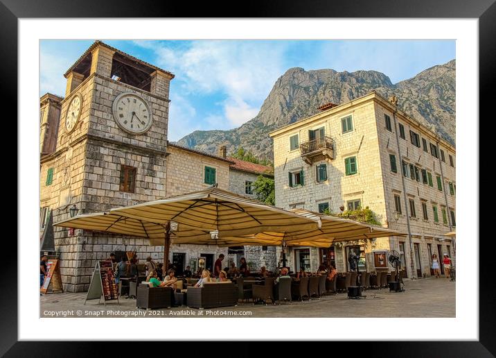 A cafe at the Clock Tower at the Square of Arms, the Old Town of Kotor Framed Mounted Print by SnapT Photography