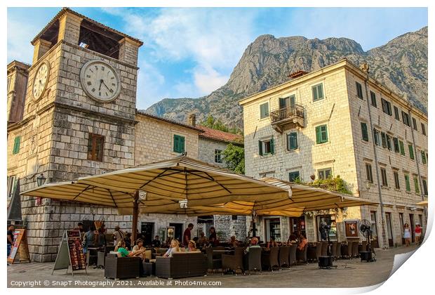 A cafe at the Clock Tower at the Square of Arms, the Old Town of Kotor Print by SnapT Photography