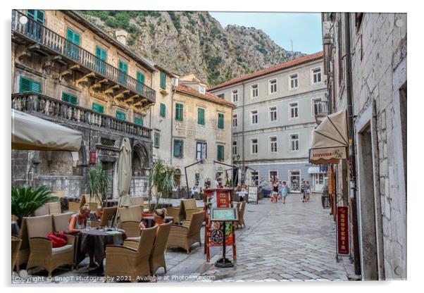 A cafe in a square at sunset, in the Old town of Kotor, Montenegro Acrylic by SnapT Photography