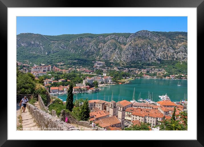 Tourists walking up the steps over looking the old town of Kotor, Montenegro Framed Mounted Print by SnapT Photography