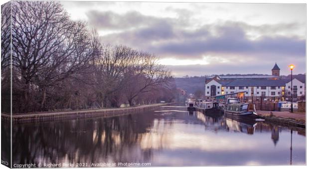 A calm morning on the Leeds - Liverpool canal Canvas Print by Richard Perks