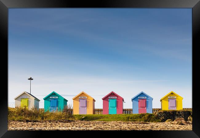 Colourful Beach Huts at Amble Framed Print by Heidi Stewart
