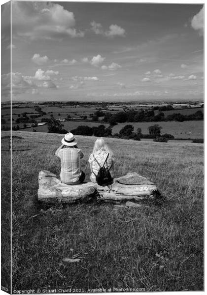 couple looking out over english landscape Canvas Print by Stuart Chard