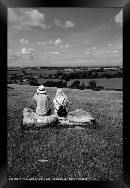 couple looking out over english landscape Framed Print by Stuart Chard