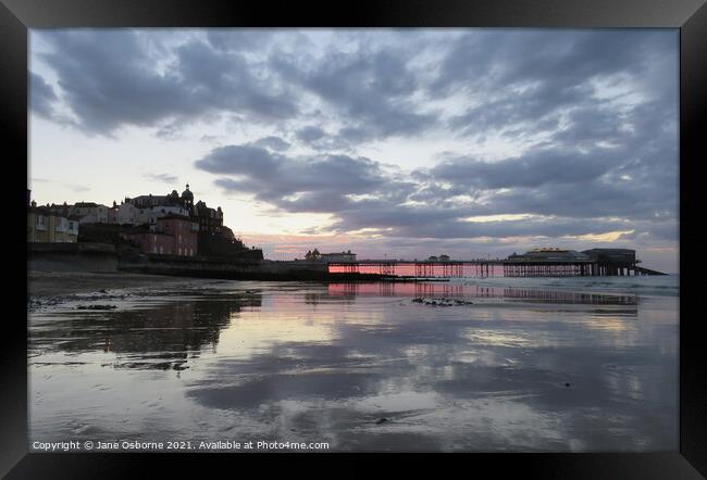 Cromer Pier Sunset and Reflections Framed Print by Jane Osborne
