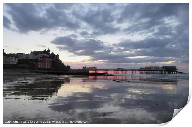 Cromer Pier Sunset and Reflections Print by Jane Osborne