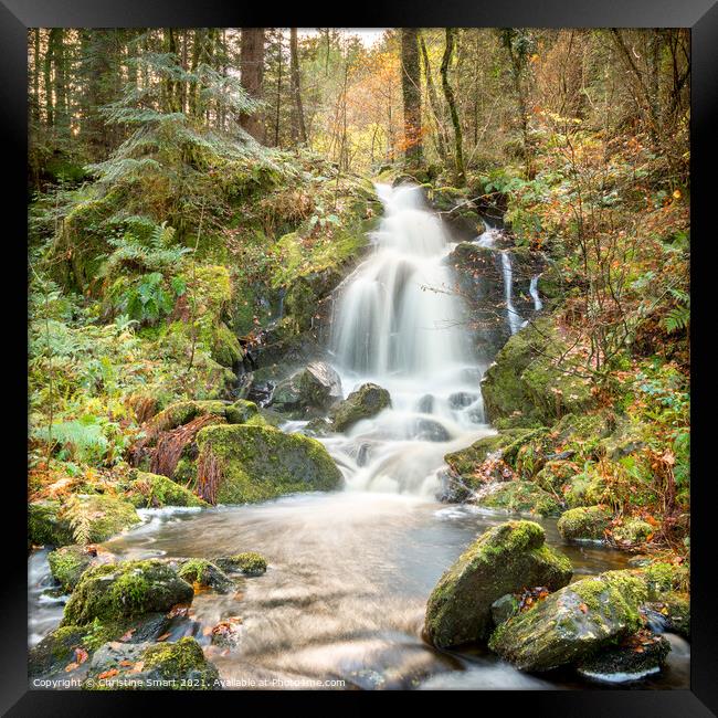 A Sunlit Forest Autumn Waterfall - Snowdonia Lands Framed Print by Christine Smart