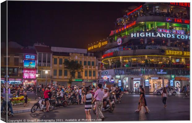 People gathering at Dong Kinh Nghia Thuc Square at night, Hanoi Canvas Print by SnapT Photography