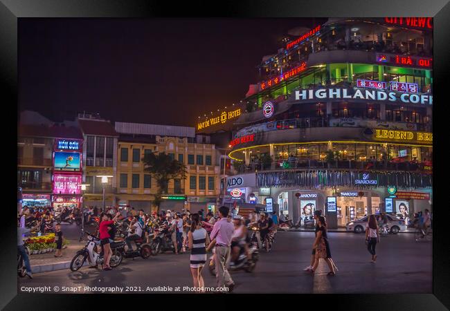 People gathering at Dong Kinh Nghia Thuc Square at night, Hanoi Framed Print by SnapT Photography
