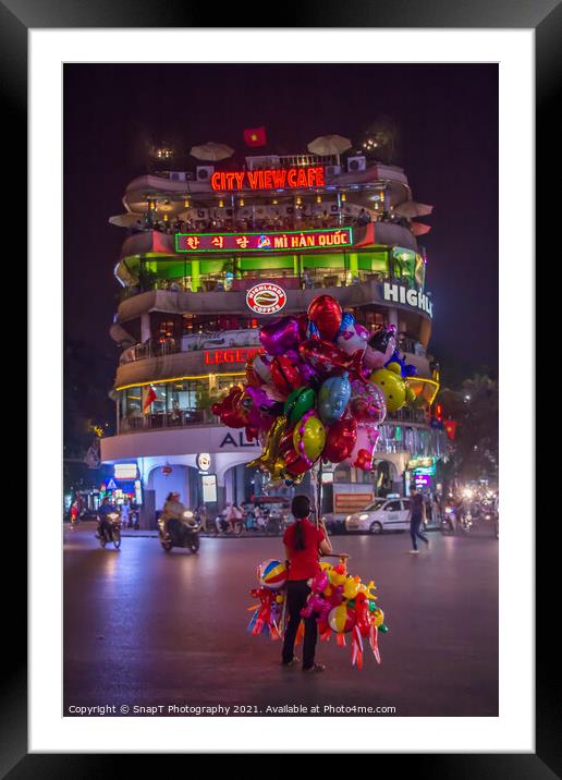 A lone balloon sellar at Dong Kinh Nghia Thuc Square, Hanoi, Vietnam. Framed Mounted Print by SnapT Photography