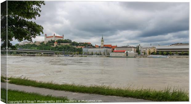 A view across the River Danube of Bratislava and Castle, Slovakia Canvas Print by SnapT Photography