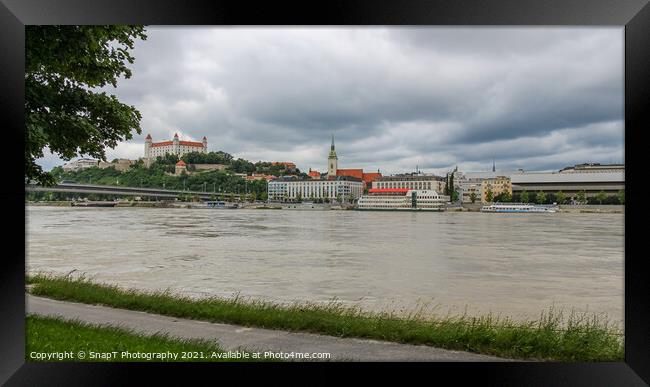 A view across the River Danube of Bratislava and Castle, Slovakia Framed Print by SnapT Photography