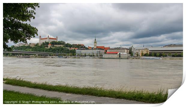 A view across the River Danube of Bratislava and Castle, Slovakia Print by SnapT Photography