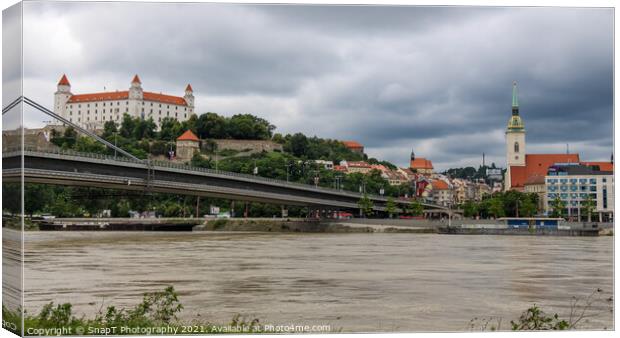 Bratislava Castle over looking the River Danube and the Most SNP Bridge Canvas Print by SnapT Photography