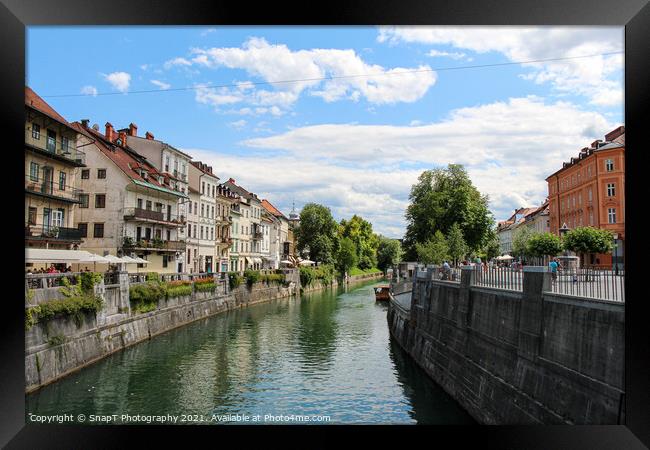 The Ljublijanica River in central Ljubljana from Cobblers Bridge, Slovenia Framed Print by SnapT Photography