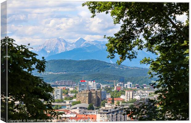 A view over Ljubljana in the summer, with Mount Saint Mary in the background Canvas Print by SnapT Photography