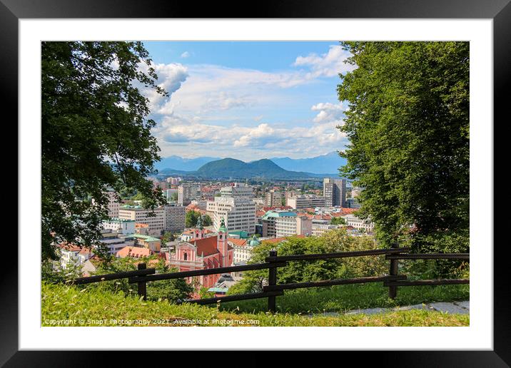 A view over Ljubljana to the mountains from the view point at Ljubljana Castle Framed Mounted Print by SnapT Photography