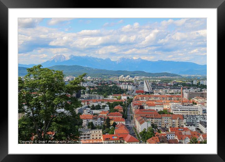 A view over Ljubljana to the mountains from the view point at Ljubljana Castle Framed Mounted Print by SnapT Photography
