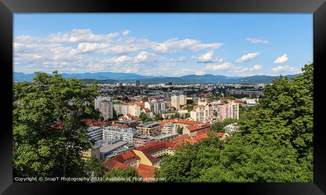 A view over Ljubljana to the mountains from the view point at Ljubljana Castle Framed Print by SnapT Photography