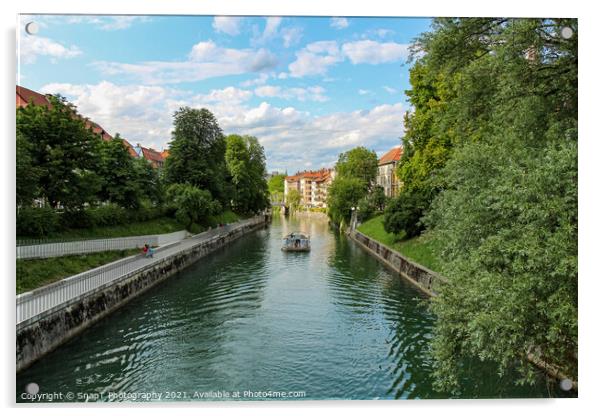 A tourist boat travelling along the Ljublijanica River in afternoon in Ljubljana Acrylic by SnapT Photography
