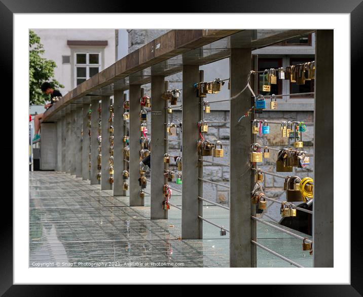 Padlocks on Butchers Bridge in the old medieval town in Ljubljana, Slovenia Framed Mounted Print by SnapT Photography