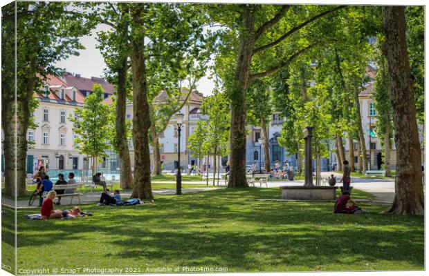 The park at Congress Square in the center of Ljubljana on a summer day, Slovenia Canvas Print by SnapT Photography