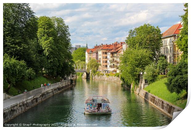 A tourist boat travelling along the Ljublijanica River in afternoon in Ljubljana Print by SnapT Photography