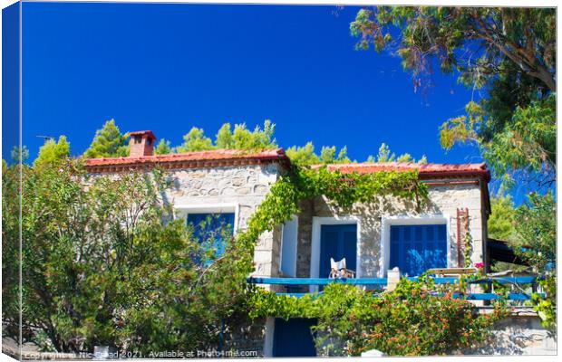 Traditional Greek House Canvas Print by Nic Croad