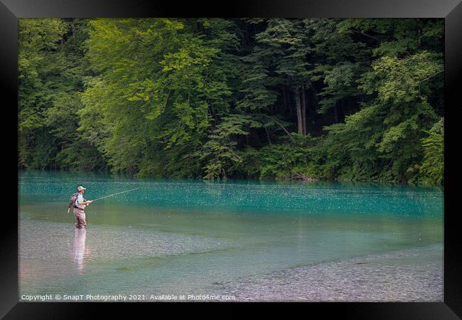 A fisherman at the Soca and Tolminka River confluence at Tolmin, Slovenia Framed Print by SnapT Photography