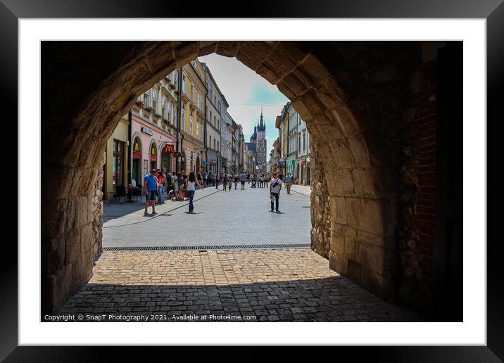 The archway entrance in St.Florian's Gate to the old town of Krakow, Poland Framed Mounted Print by SnapT Photography