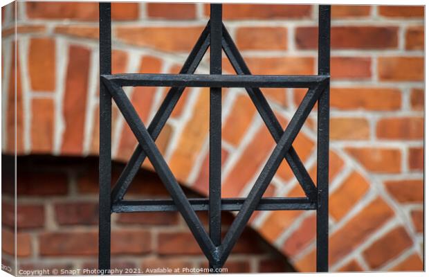 The star of david symbol on the railing at the Stara old Synagogue, Kazimierz, Jewish Quarter, Krakow Canvas Print by SnapT Photography