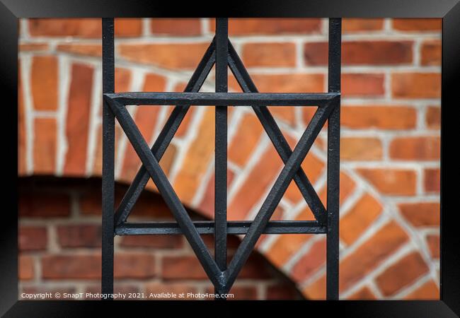 The star of david symbol on the railing at the Stara old Synagogue, Kazimierz, Jewish Quarter, Krakow Framed Print by SnapT Photography