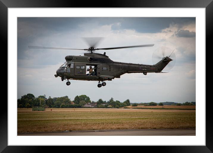 Puma Helicopter Framed Mounted Print by J Biggadike