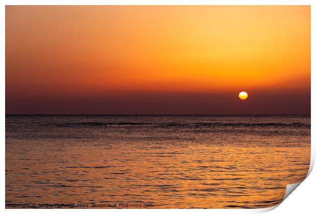 Bright sunset with a big yellow sun under the sea surface. Print by Sergey Fedoskin