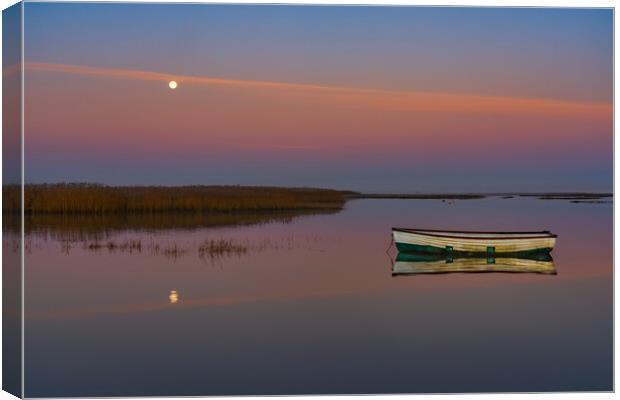 A setting moon at Brancaster Staithe  Canvas Print by Gary Pearson