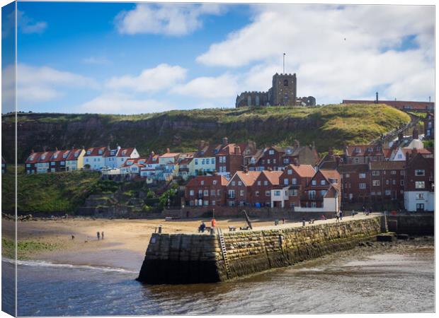Whitby Abbey overlooking the harbour wall Canvas Print by David Hall