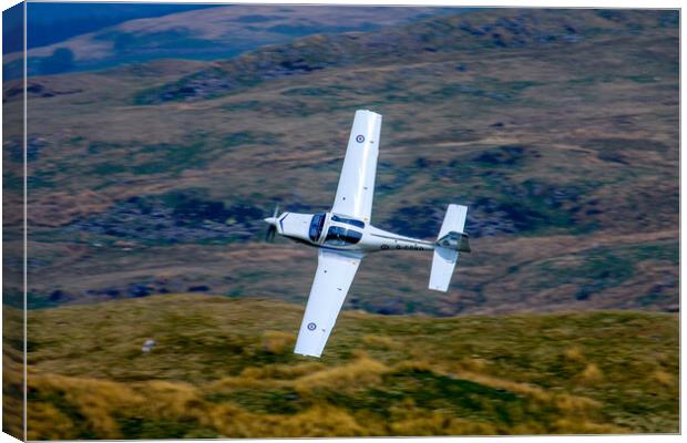 Grob Tutor In The Mach Loop Canvas Print by Oxon Images