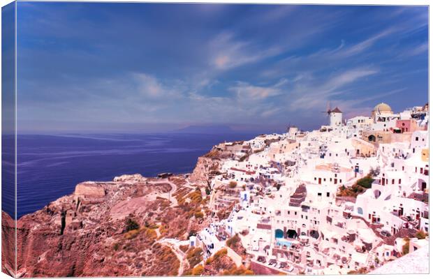Santorini, Greece - September 11, 2017: Wide angle panoramic view of Oia Santorini white buildings on the hillside facing north against the blue sky. Cityscape of famous greek island Canvas Print by Arpan Bhatia
