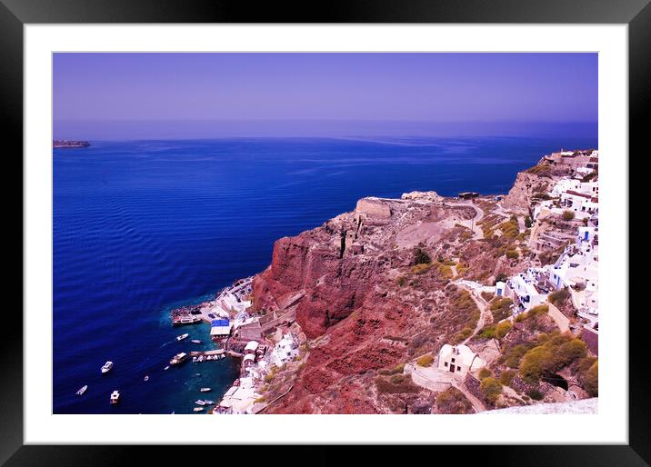 Imerovigli, Santorini, South Aegean, Greece. View to the clifftop village during daytime. Wide angle shot of houses on a volcanic mountain against blue mediterranean sea in Oia Framed Mounted Print by Arpan Bhatia