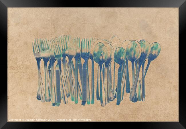 Cutlery forks and metal steel spoons for feeding, clean and isol Framed Print by Joaquin Corbalan