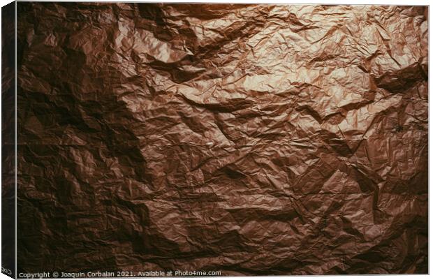 Crumpled and expanded paper with natural texture of reddish tone Canvas Print by Joaquin Corbalan