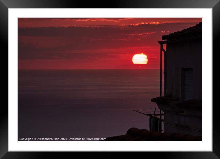 Beautiful view of the red sunset sky over the sea in the Belvedere village, Italy Framed Mounted Print by Alessandro Mari