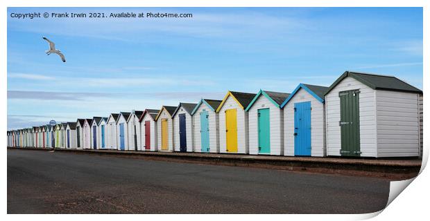 Beach huts parallel to the coastline Print by Frank Irwin