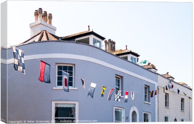 Regatta Bunting Flying Outside Cottages In Shaldon Canvas Print by Peter Greenway