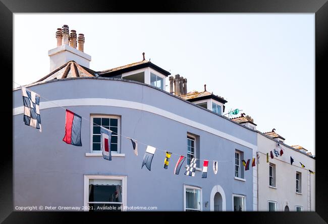 Regatta Bunting Flying Outside Cottages In Shaldon Framed Print by Peter Greenway
