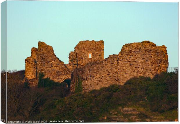 Hastings Castle viewed from the Seafront. Canvas Print by Mark Ward