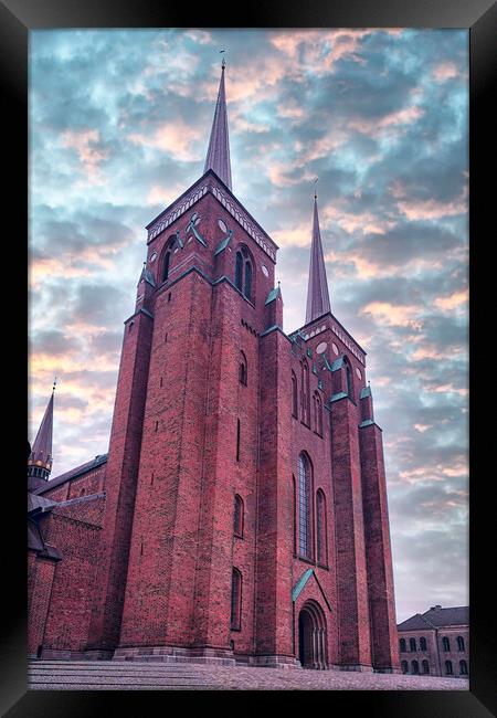 Roskilde Cathedral with Dramatic Sky Framed Print by Antony McAulay