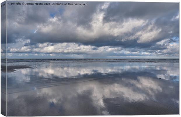 Reflections on Westward Ho! beach Canvas Print by James Moore