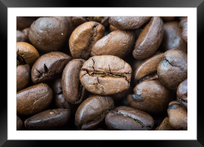 Dark roasted coffee beans ,close up Framed Mounted Print by Emils Vanags