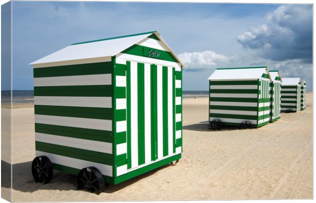 Green and White Beach Huts on Wheels Canvas Print by Arterra 